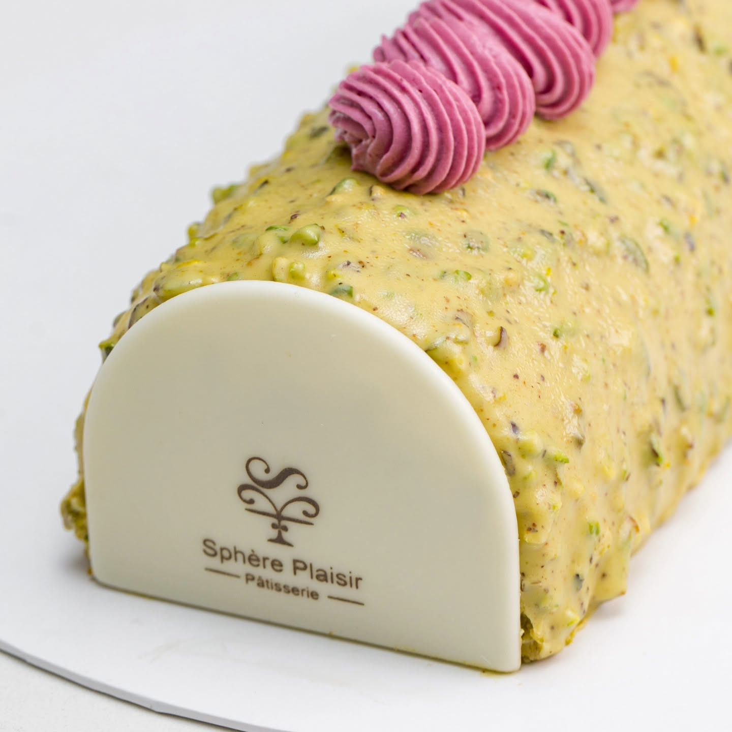 Bûche pistache framboise Sphère Plaisir